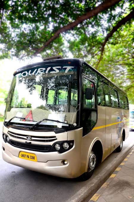 27 seater mini luxury coach on rent in Delhi